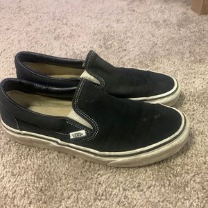 Slip on Black vans.